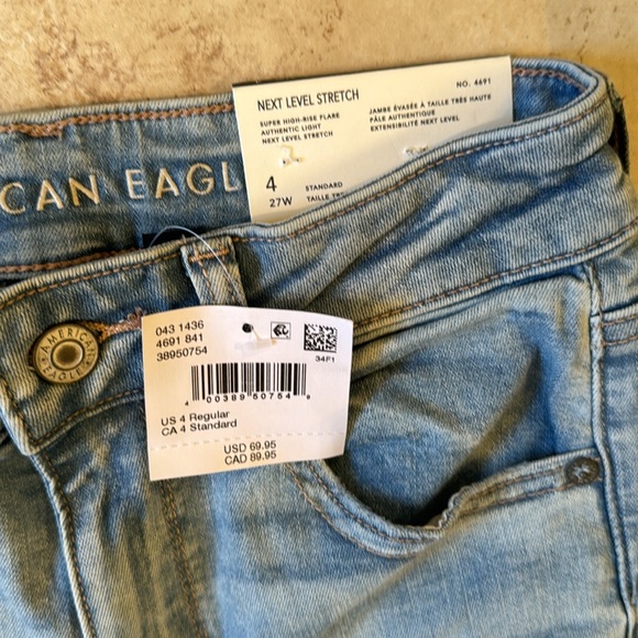 NWT American Eagle super high rise flare distressed jeans. Size 4. - Picture 3 of 5